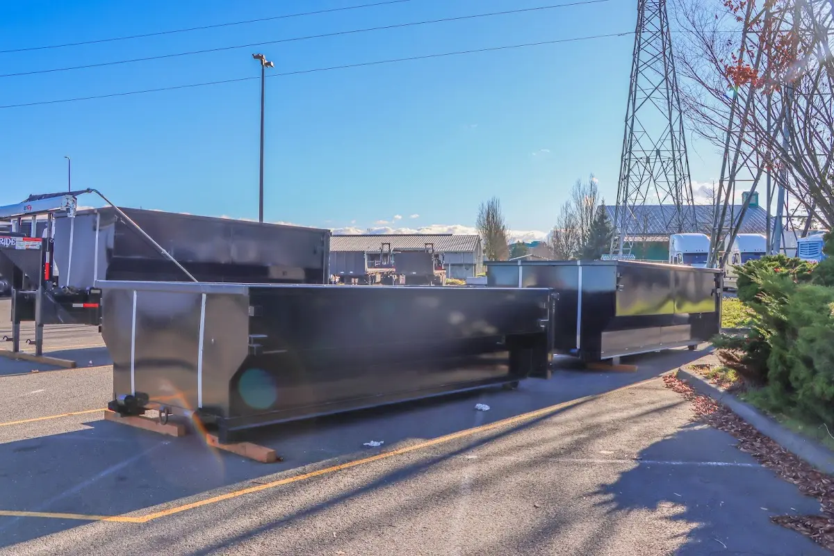 Roll-off dumpster ready for waste disposal at job site for 2 Yard Dumpster Rental in Liberty